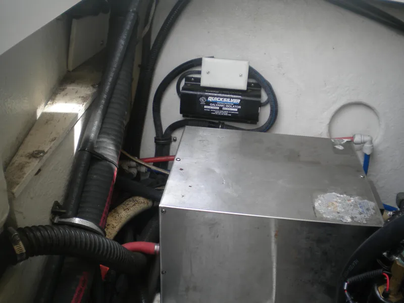 Slide: The Image of Engine compartment of a 2002 Formula 330 SS boat with galvanic isolator and wiring. - 28