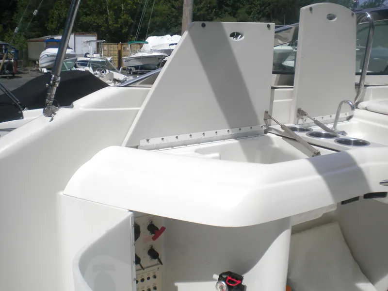 Slide: The Image of 2002 Formula 330 SS boat interior with sink and cup holders. - 8