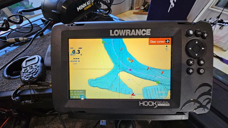 Slide: The Image of Lowrance Hook Reveal GPS on 2021 Tracker Targa V-18 Combo boat dashboard. - 16