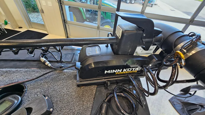 Slide: The Image of Minn Kota PowerDrive motor on 2021 Tracker Targa V-18 Combo boat in garage. - 17