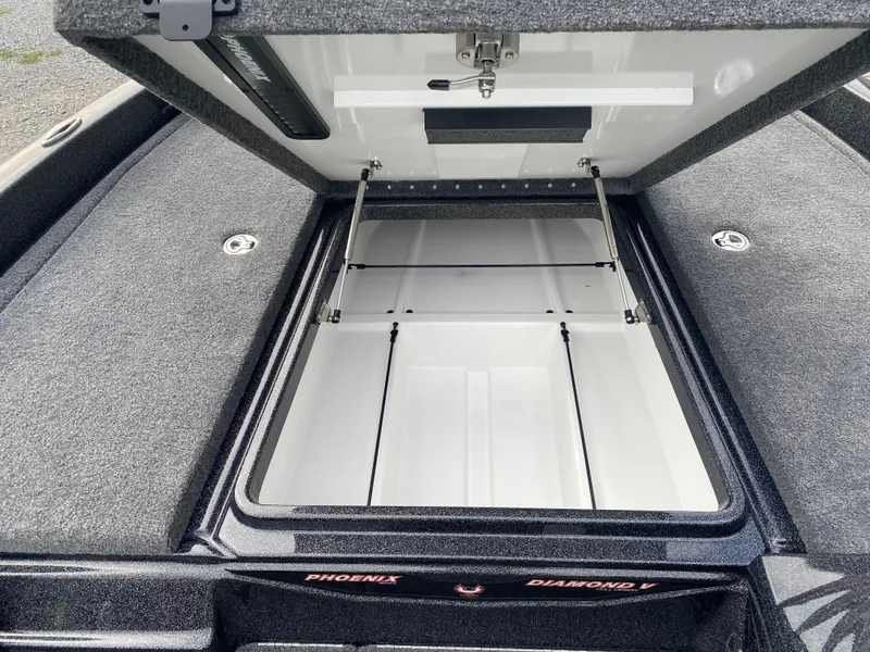 Slide: The Image of Open storage compartment of 2025 Phoenix 818 Pro boat, showcasing spacious interior. - 14