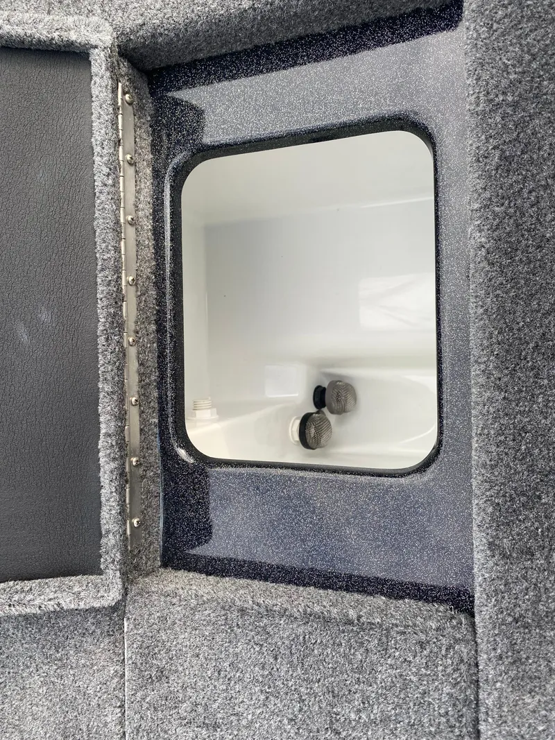 Slide: The Image of Interior compartment of 2025 Phoenix 818 Pro boat, featuring a sleek, modern design. - 19