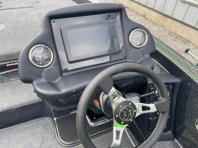 Slide: The Image of 2025 Phoenix 818 Pro boat dashboard with steering wheel and digital display. - 7