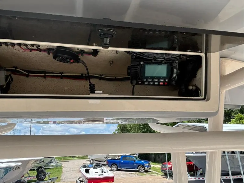 Slide: The Image of 2022 Carolina Skiff 26 Ultra Elite boat console with electronic equipment. - 11