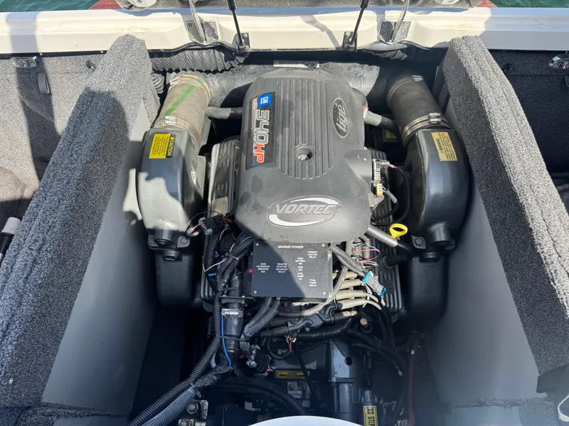 Slide: The Image of 2006 Tigé 22V boat engine compartment with Vortec 340 HP engine. - 12