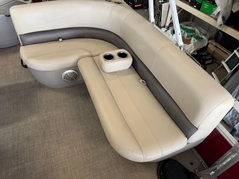 Slide: The Image of 2023 Sun Tracker Bass Buggy 18 DLX boat seating with cup holders and speaker. - 12