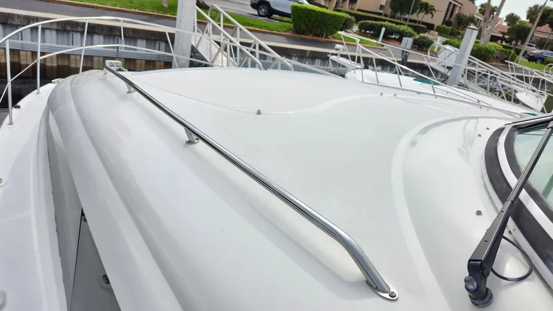 Slide: The Image of 2005 Sea Ray 390 Motor Yacht deck with stainless steel handrails. - 11