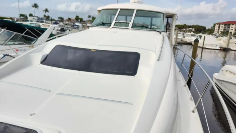 Slide: The Image of 2005 Sea Ray 390 Motor Yacht docked at marina. - 16