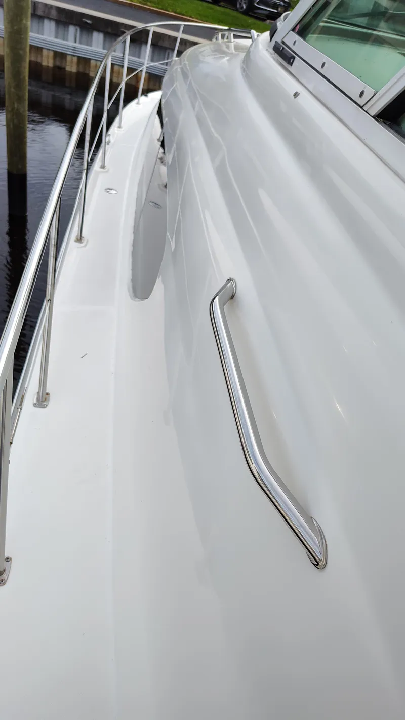 Slide: The Image of 2005 Sea Ray 390 Motor Yacht side deck with stainless steel handrail. - 17