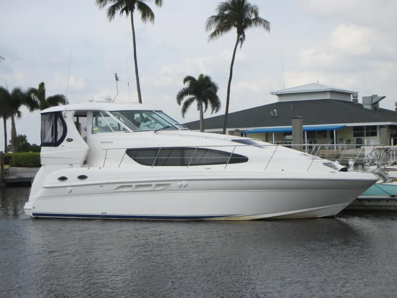 Slide: The Image of 2005 Sea Ray 390 Motor Yacht docked at marina. - 2