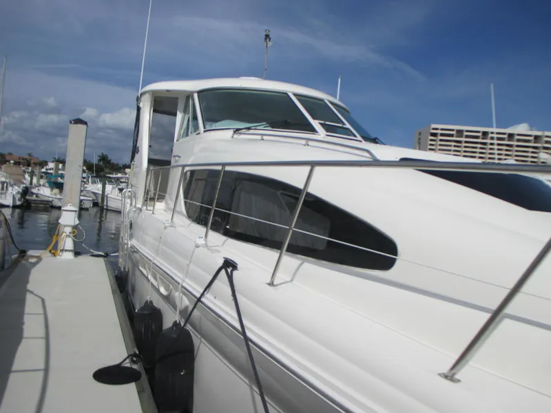 Slide: The Image of 2005 Sea Ray 390 Motor Yacht docked at marina. - 4