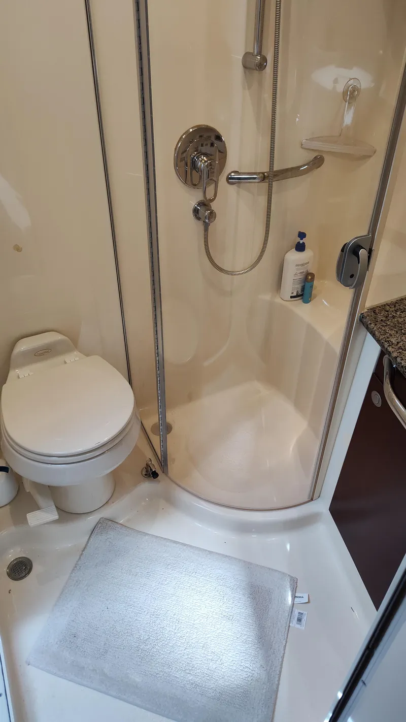 Slide: The Image of Bathroom in 2005 Sea Ray 390 Motor Yacht with shower and toilet. - 44