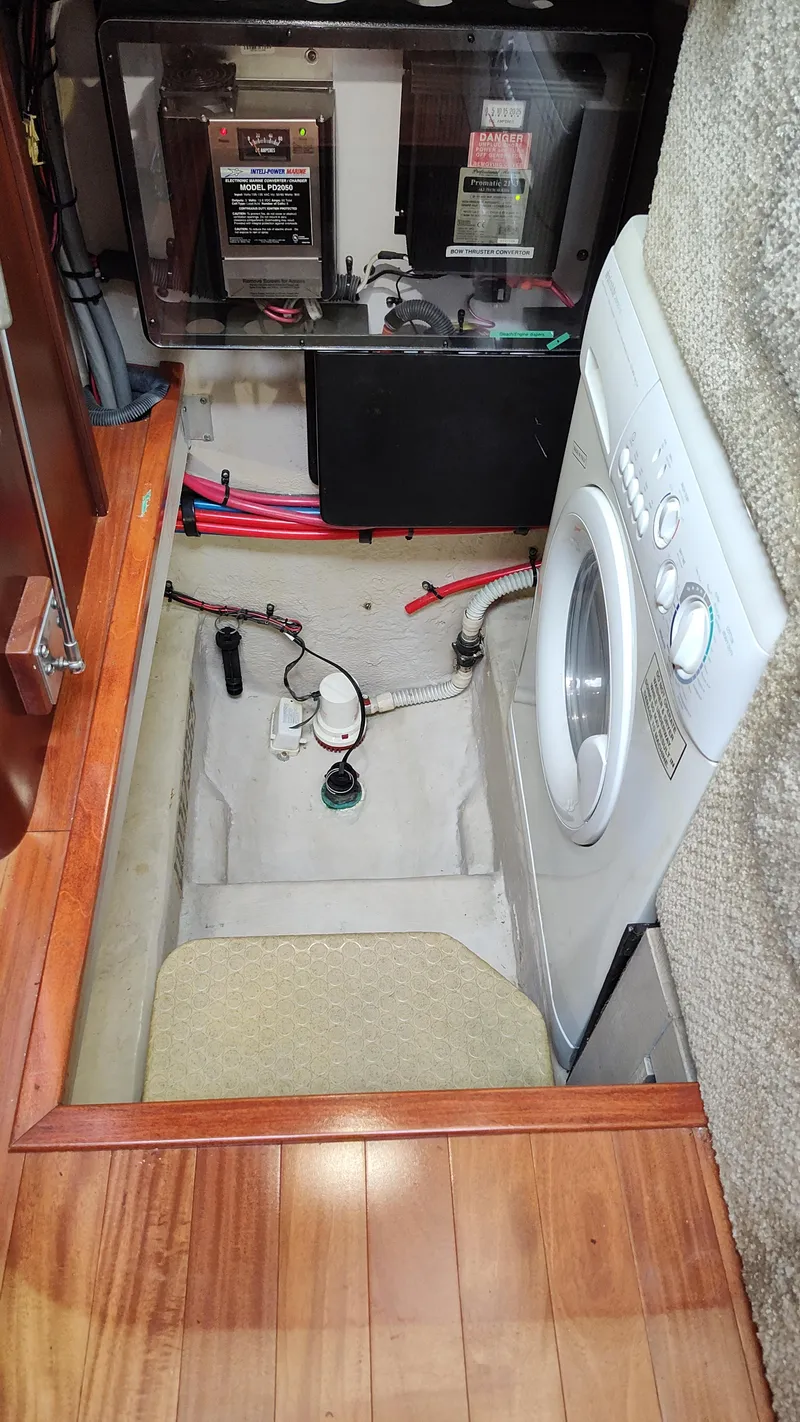 Slide: The Image of Laundry area in 2005 Sea Ray 390 Motor Yacht with washing machine. - 46