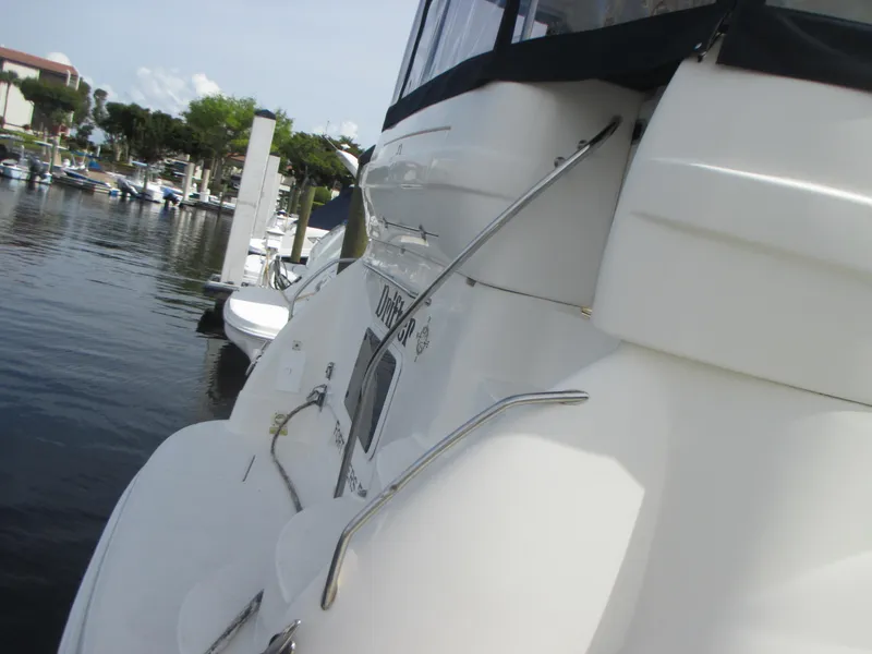 Slide: The Image of 2005 Sea Ray 390 Motor Yacht docked at marina. - 9