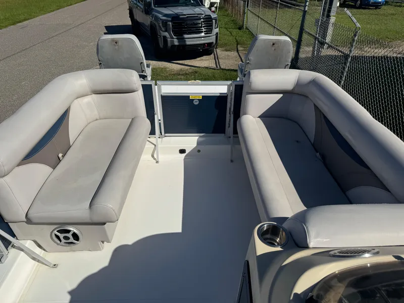 Slide: The Image of 2018 Hurricane FunDeck 226F OB interior with spacious seating and cup holders. - 5