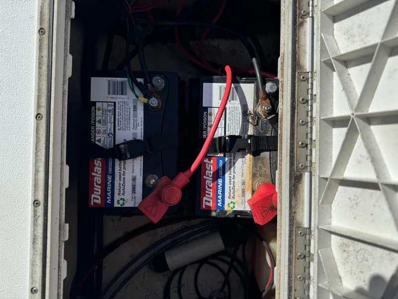 Slide: The Image of Marine batteries in a 2018 Hurricane FunDeck 226F OB boat compartment. - 7