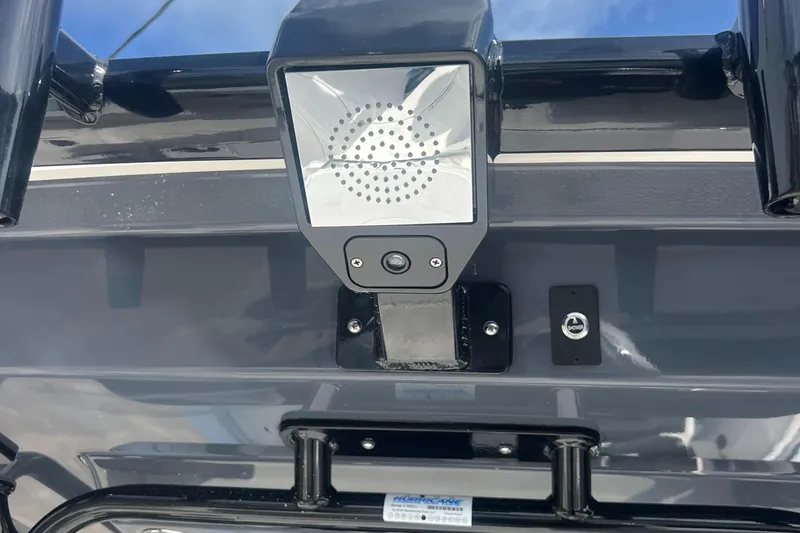 Slide: The Image of 2025 Robalo R300 Center Console boat detail with mounted light and camera. - 12