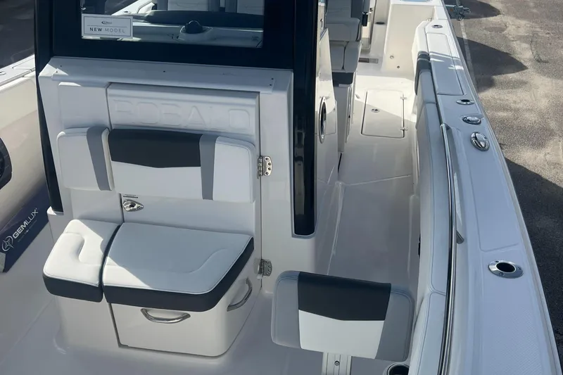 Slide: The Image of 2025 Robalo R300 Center Console boat interior with sleek seating and modern design. - 15