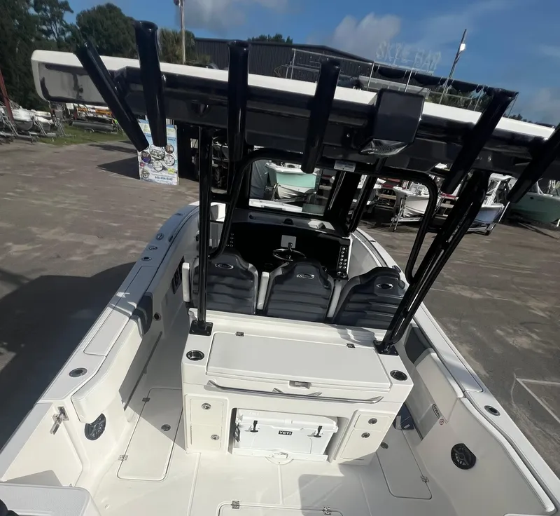 Slide: The Image of 2025 Robalo R300 Center Console boat with spacious deck and seating. - 8