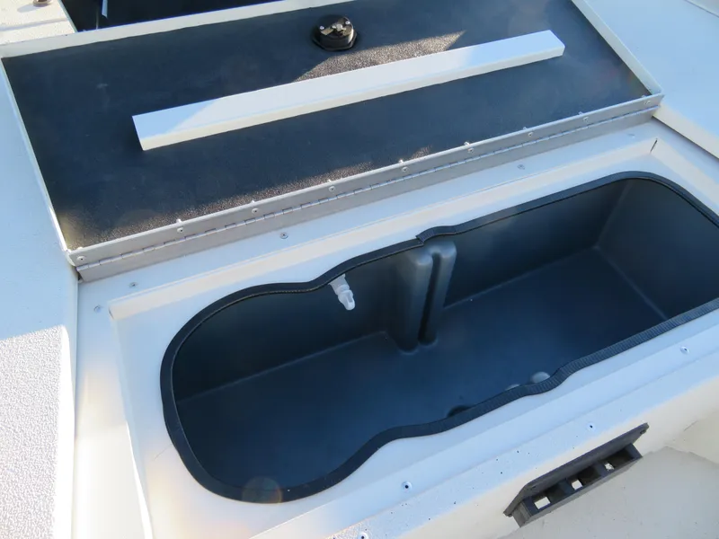 Slide: The Image of Open storage compartment on 2024 Ranger RB200 boat, featuring a spacious interior. - 10