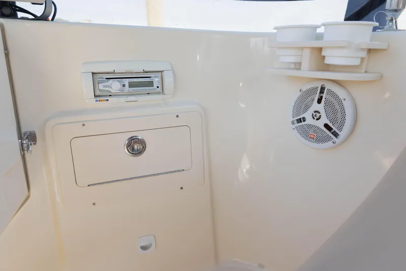 Slide: The Image of 2006 Mainship 400 Trawler interior with stereo system and speaker. - 26