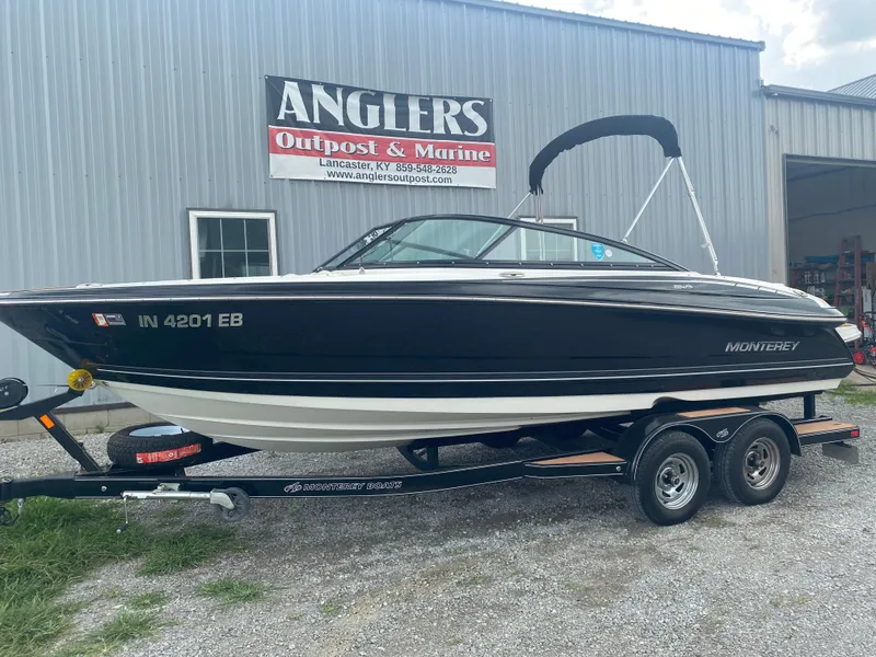 Slide: The Image of 2018 Monterey 224FS boat on trailer at Anglers Outpost & Marine. - 2