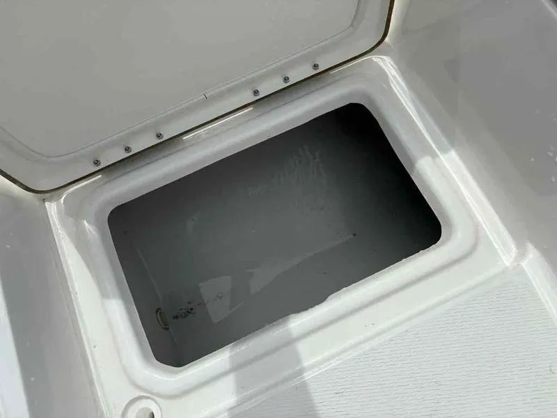 Slide: The Image of Open storage compartment on 2026 Blazer PureBay 2200 boat. - 12