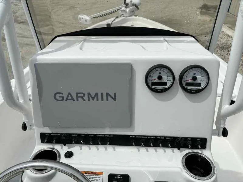 Slide: The Image of 2026 Blazer PureBay 2200 dashboard with Garmin display and gauges. - 21