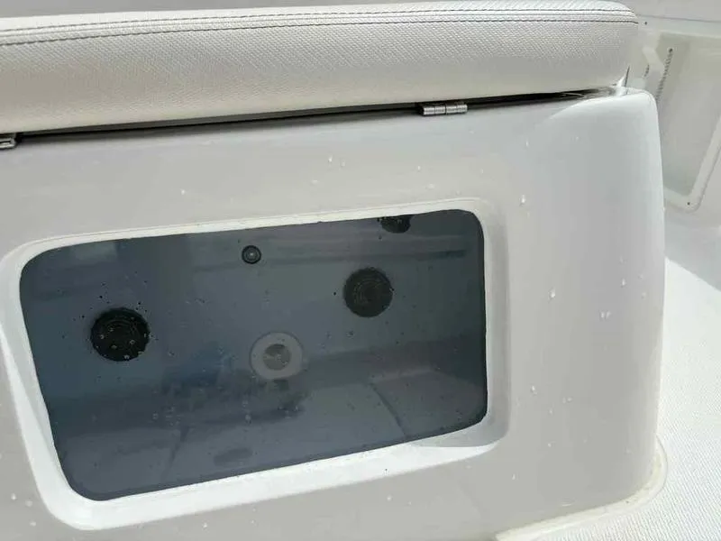 Slide: The Image of Livewell compartment on 2026 Blazer PureBay 2200 boat, featuring a transparent window. - 7