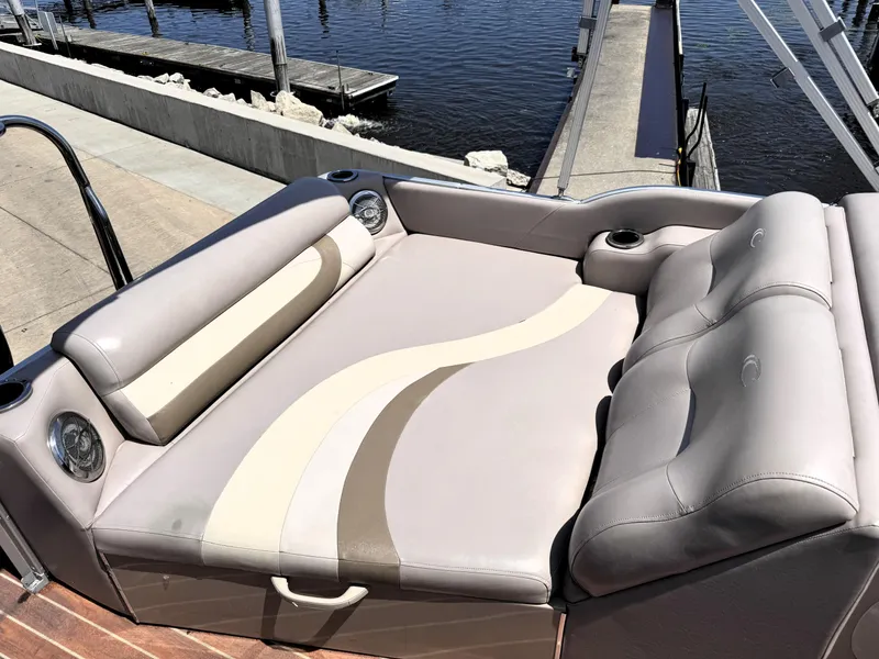 Slide: The Image of Luxurious seating on a 2013 Crest Classic 230SLR pontoon boat at a dock. - 8