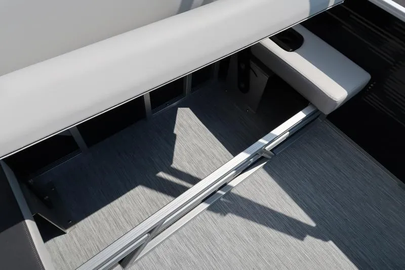 Slide: The Image of 2026 Bennington S Swingback 22 SSB interior seating and flooring detail. - 10