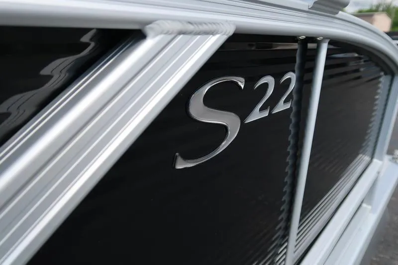 Slide: The Image of 2026 Bennington S Swingback 22 SSB boat emblem close-up. - 16