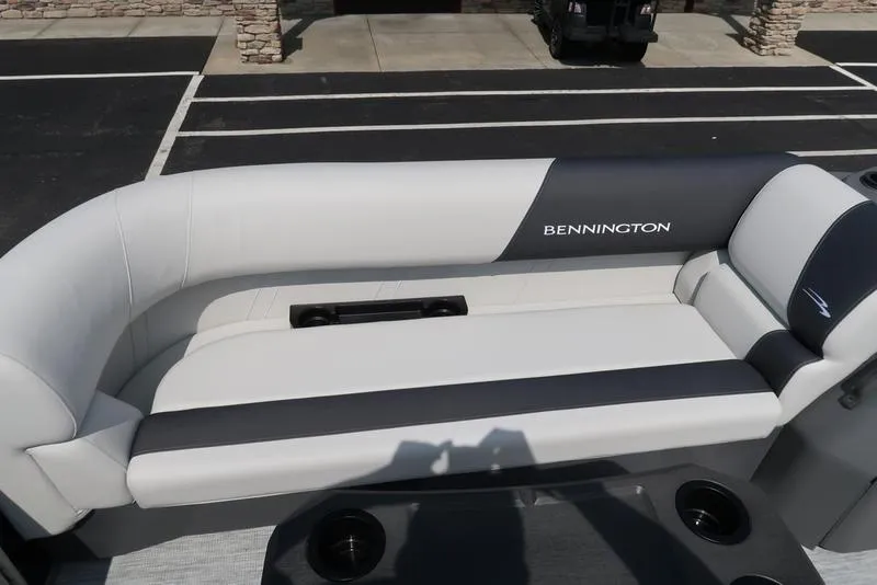 Slide: The Image of 2026 Bennington S Swingback 22 SSB boat seating, featuring sleek white and gray upholstery. - 19