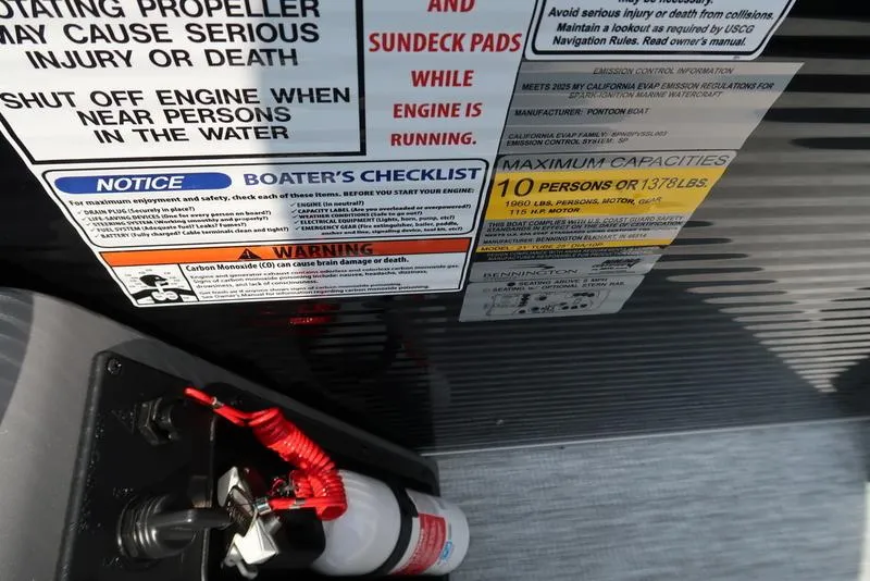 Slide: The Image of Control panel of 2026 Bennington S Swingback 22 SSB boat with throttle and safety warnings. - 2