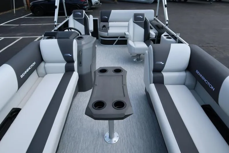 Slide: The Image of 2026 Bennington S Swingback 22 SSB pontoon boat interior with seating and table. - 20