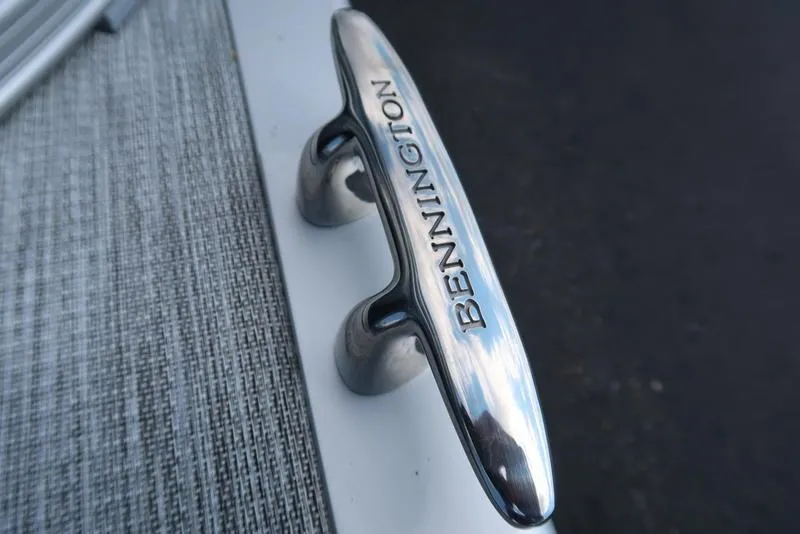 Slide: The Image of Close-up of a Bennington cleat on a 2026 S Swingback 22 SSB boat. - 23