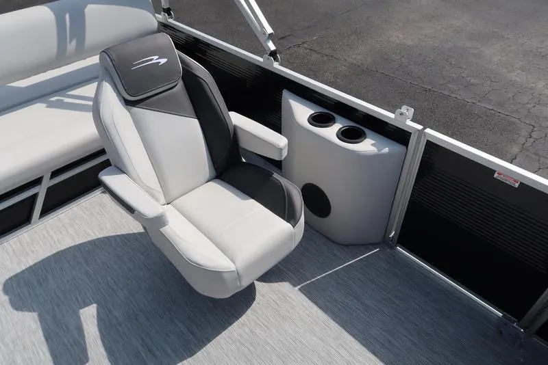 Slide: The Image of 2026 Bennington S Swingback 22 SSB boat interior with plush seating and cup holders. - 25