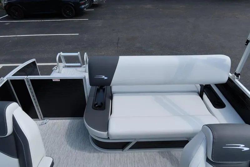 Slide: The Image of 2026 Bennington S Swingback 22 SSB boat interior with sleek seating design. - 29