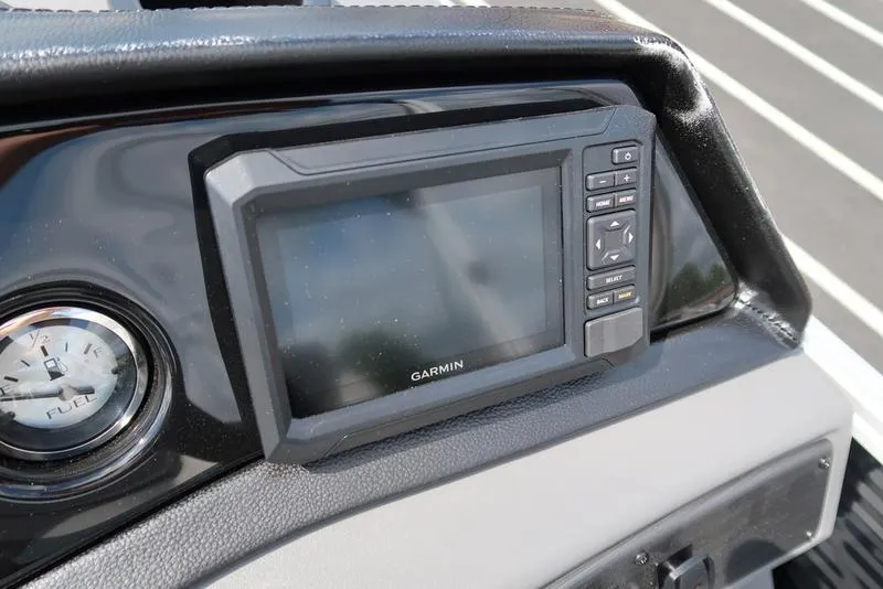 Slide: The Image of Garmin display and fuel gauge on 2026 Bennington S Swingback 22 SSB boat dashboard. - 37