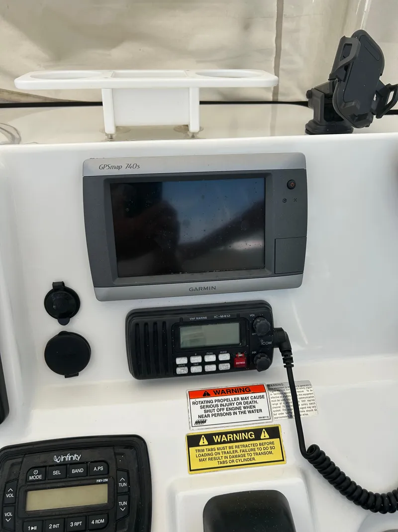 Slide: The Image of Control panel of a 2013 Sea Hunt Edge 24 boat with Garmin GPS and radio. - 9