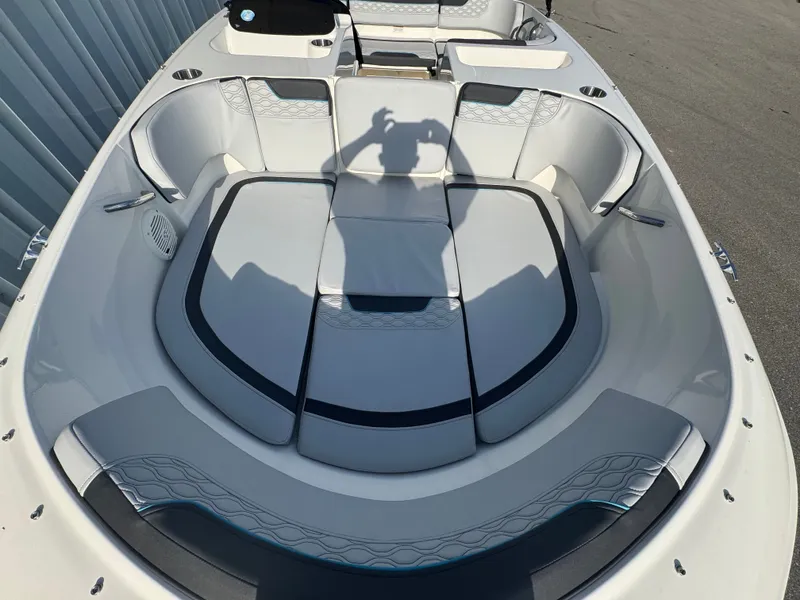 Slide: The Image of 2022 Bayliner Element M17 boat interior with cushioned seating and modern design. - 4