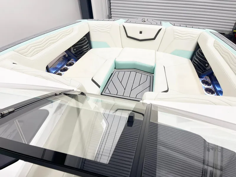 Slide: The Image of 2025 Nautique Super Air Nautique G23 interior with luxurious seating and modern design. - 5