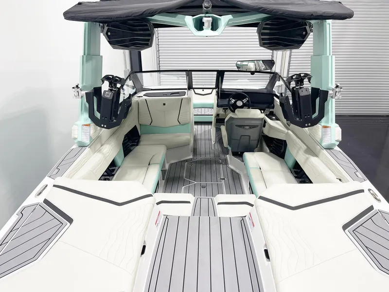 Slide: The Image of 2025 Nautique Super Air Nautique G23 interior with sleek seating and modern design. - 6