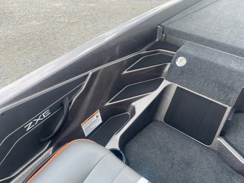 Slide: The Image of Interior of 2026 Skeeter ZXE 21 boat, featuring sleek design and comfortable seating. - 11