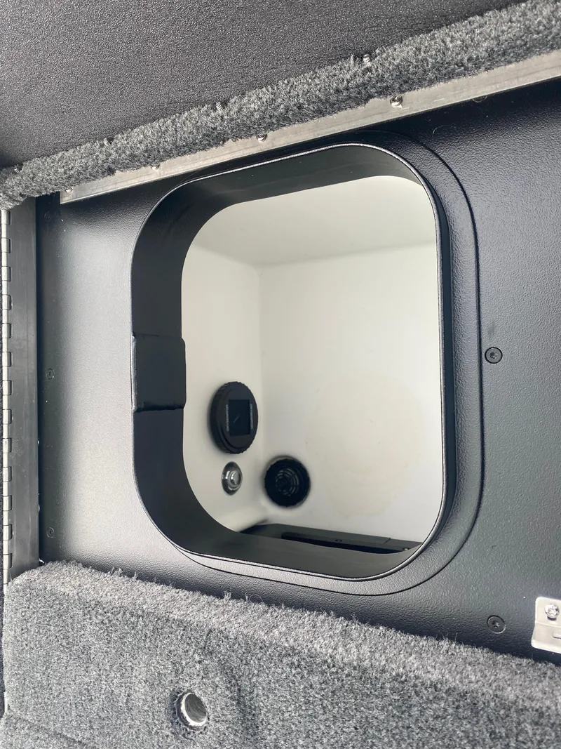 Slide: The Image of Interior compartment of 2026 Skeeter ZXE 21 boat, featuring a sleek, modern design. - 21