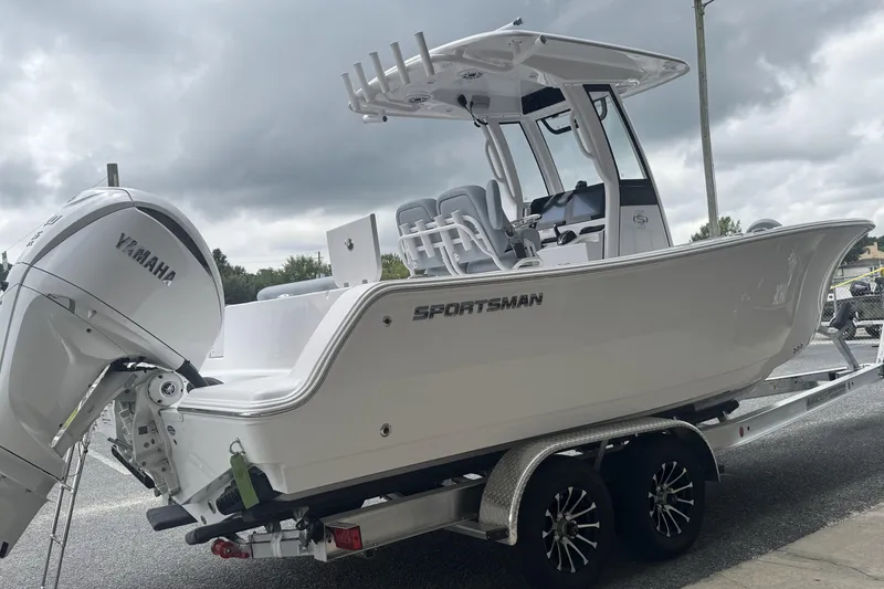 Slide: The Image of 2026 Sportsman Open 232 Center Console boat with Yamaha engine on trailer. - 6