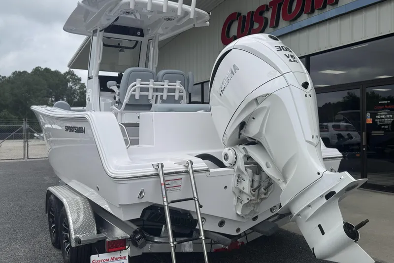 Slide: The Image of 2026 Sportsman Open 232 Center Console boat with Yamaha engine on trailer. - 7