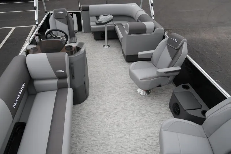 Slide: The Image of 2025 Bennington S L-Bench 21 SLJ pontoon boat interior with gray seating and helm. - 5