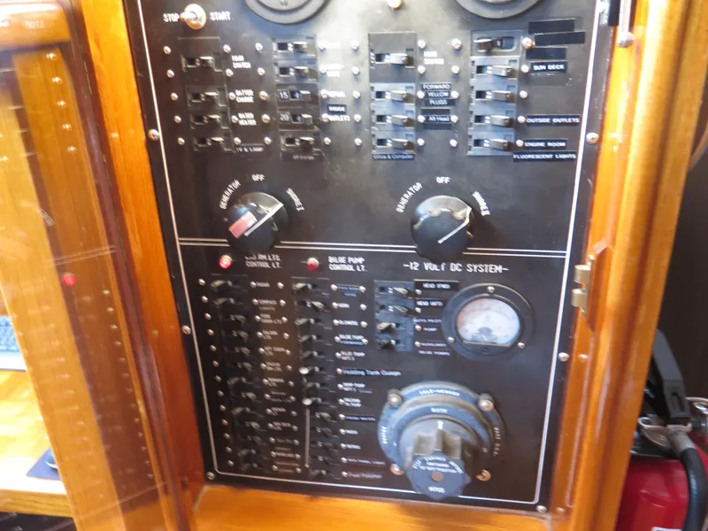 Slide: The Image of Electrical control panel on a 1985 CHB Flush Deck Aft Cabin boat. - 29