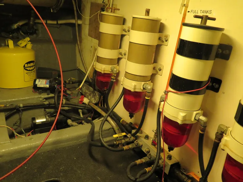 Slide: The Image of Engine room of 1985 CHB Flush Deck Aftcabin with fuel filters and equipment. - 32